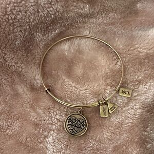 Elegant Gold Bangle with Heart and Tag Charms